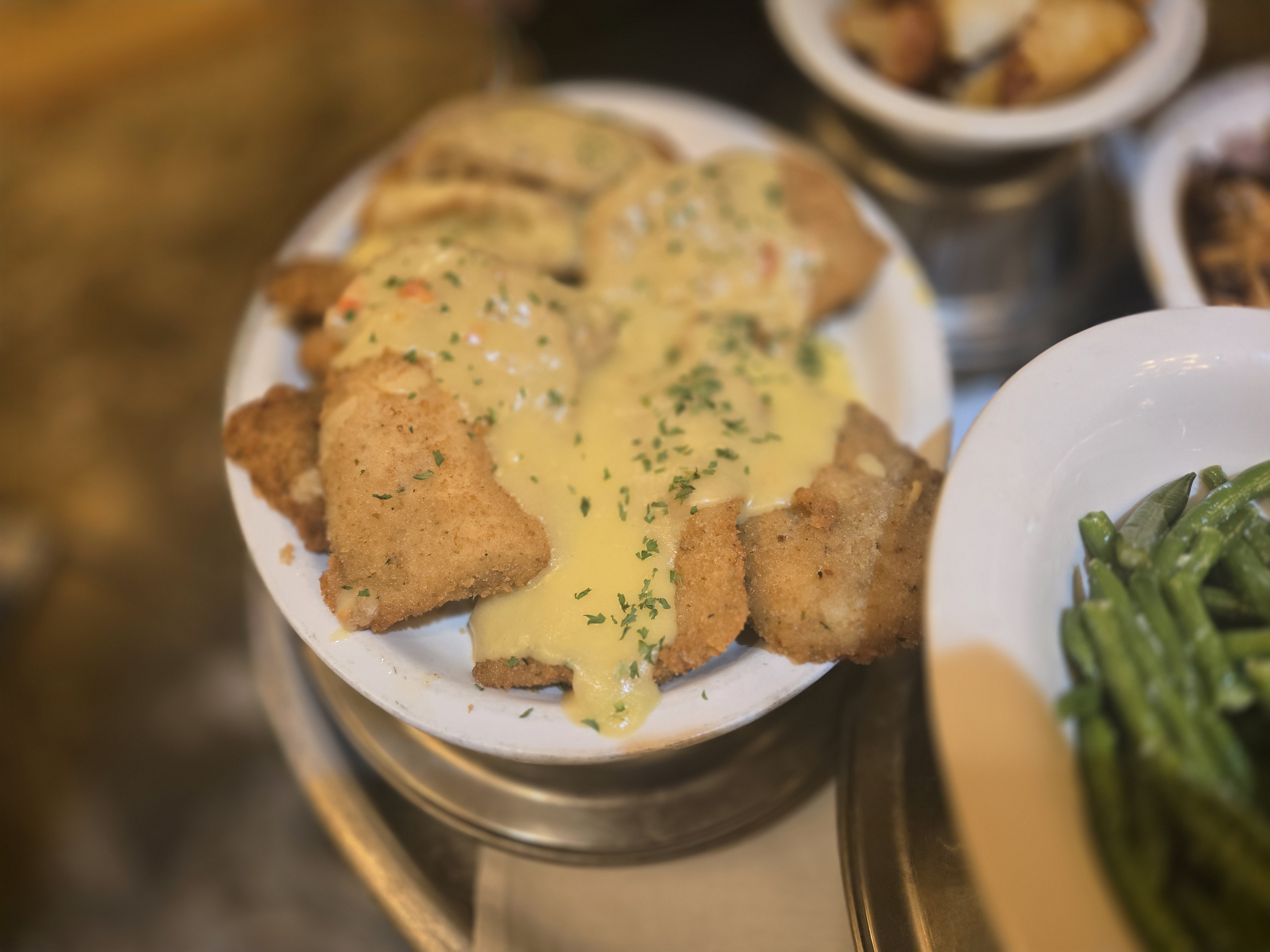 Guests raising glasses together